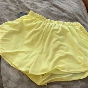 Neon yellow flowy shorts